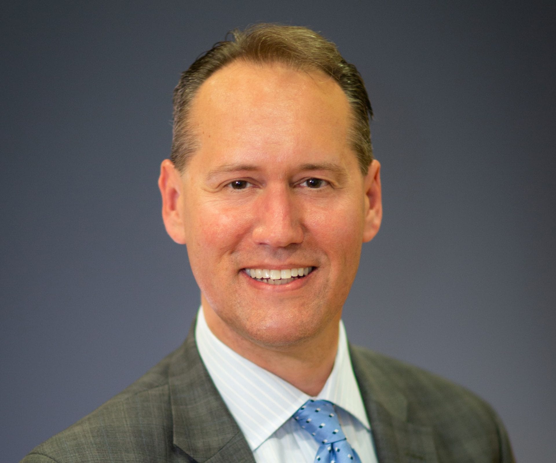 Christopher Riegg, expert in family business succession planning and financial strategy