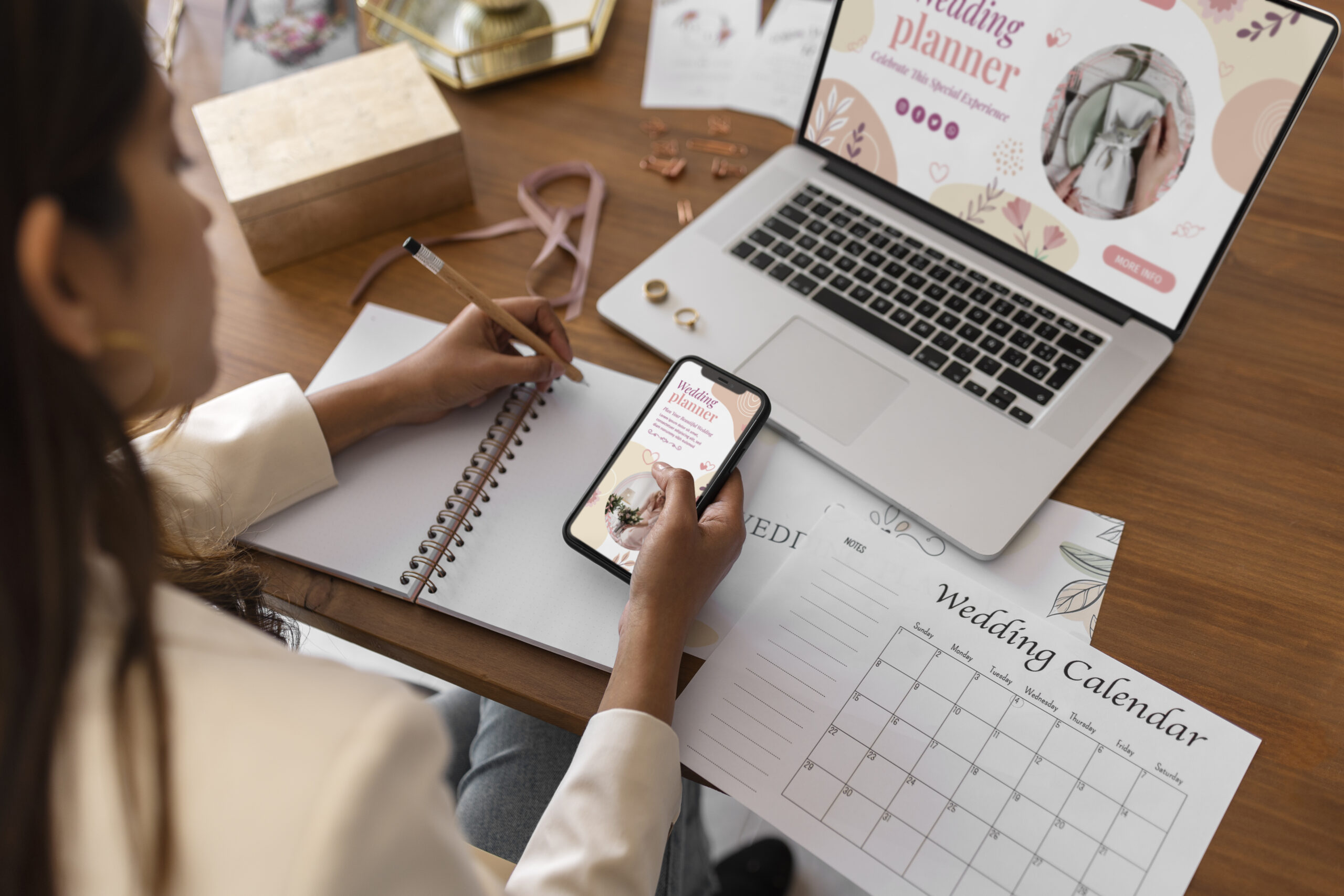 Event planner managing wedding details from a high angle, showcasing online event planning workflow.