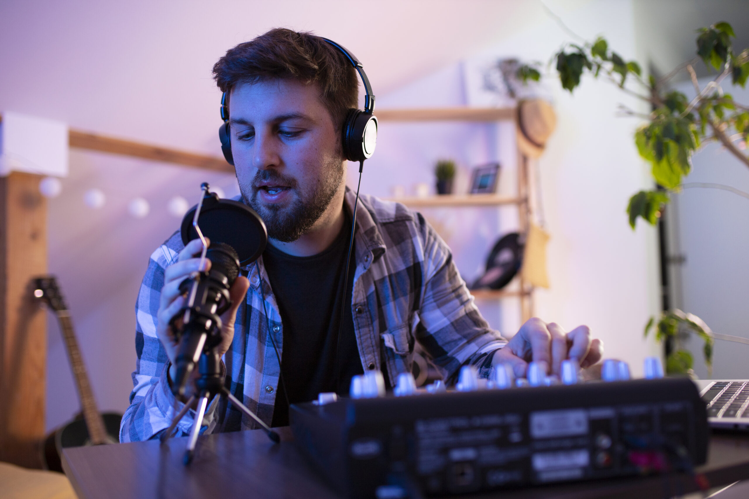Voiceover artist working in a bedroom recording studio