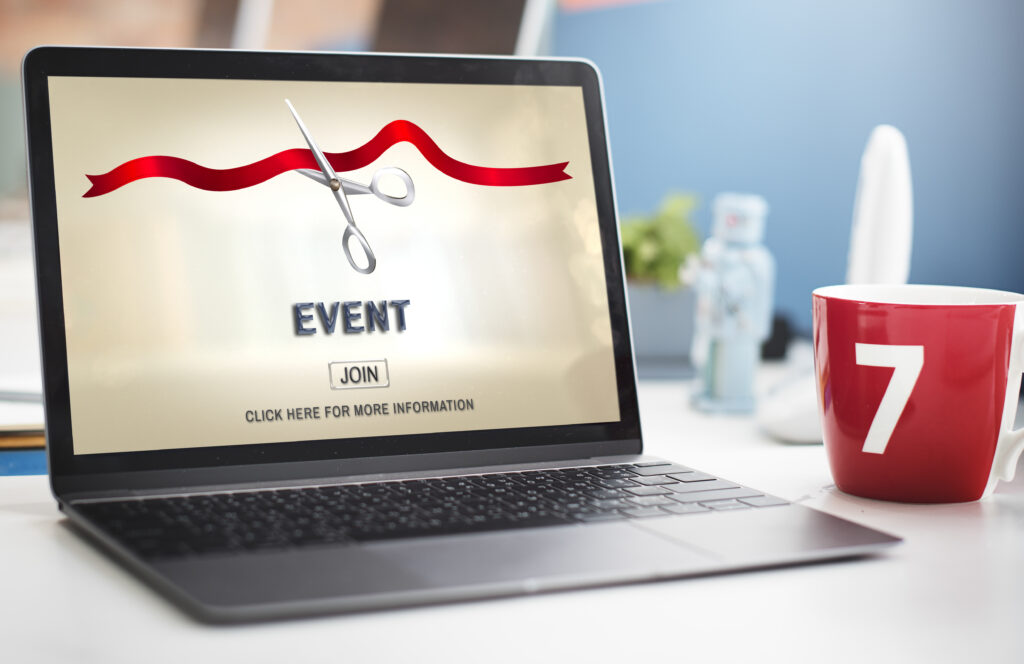 Online event planner organizing a virtual ribbon-cutting ceremony for a new business launch.